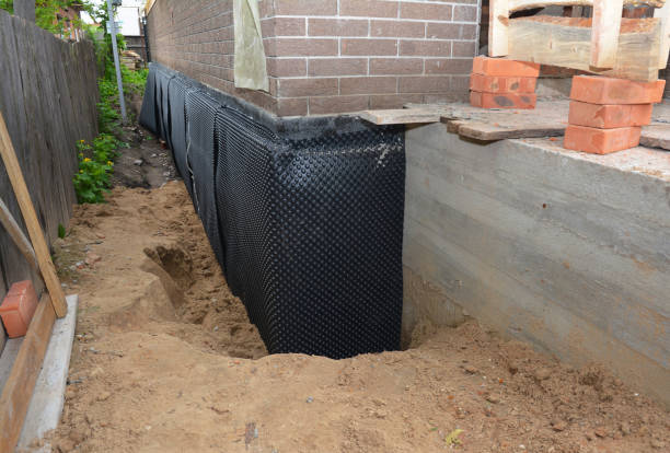 Happy homeowners after waterproofing job in Vermontville